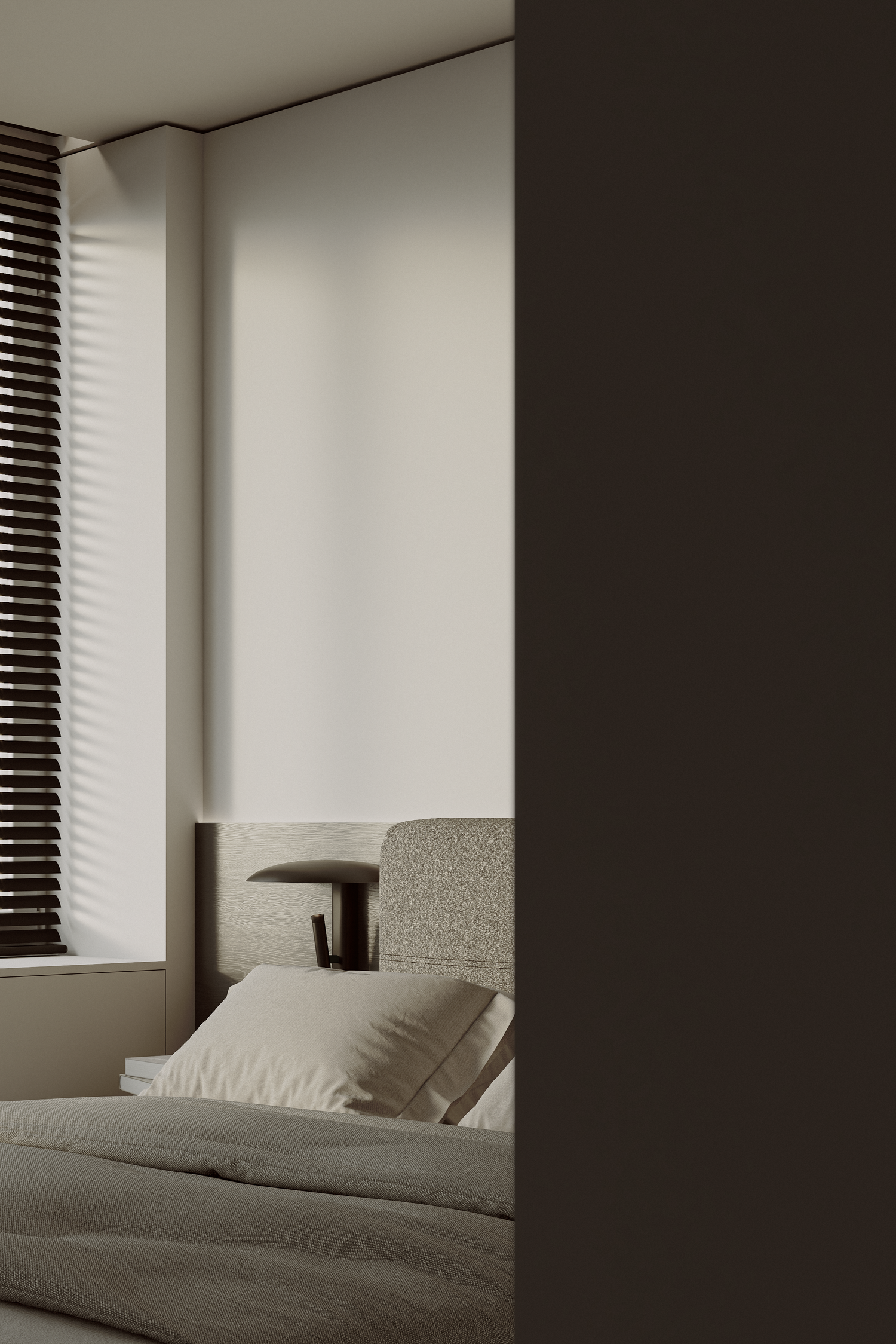 Minimalist bedroom with neutral tones, upholstered headboard, white pillows, bedside lamp, and wooden blinds filtering soft light.