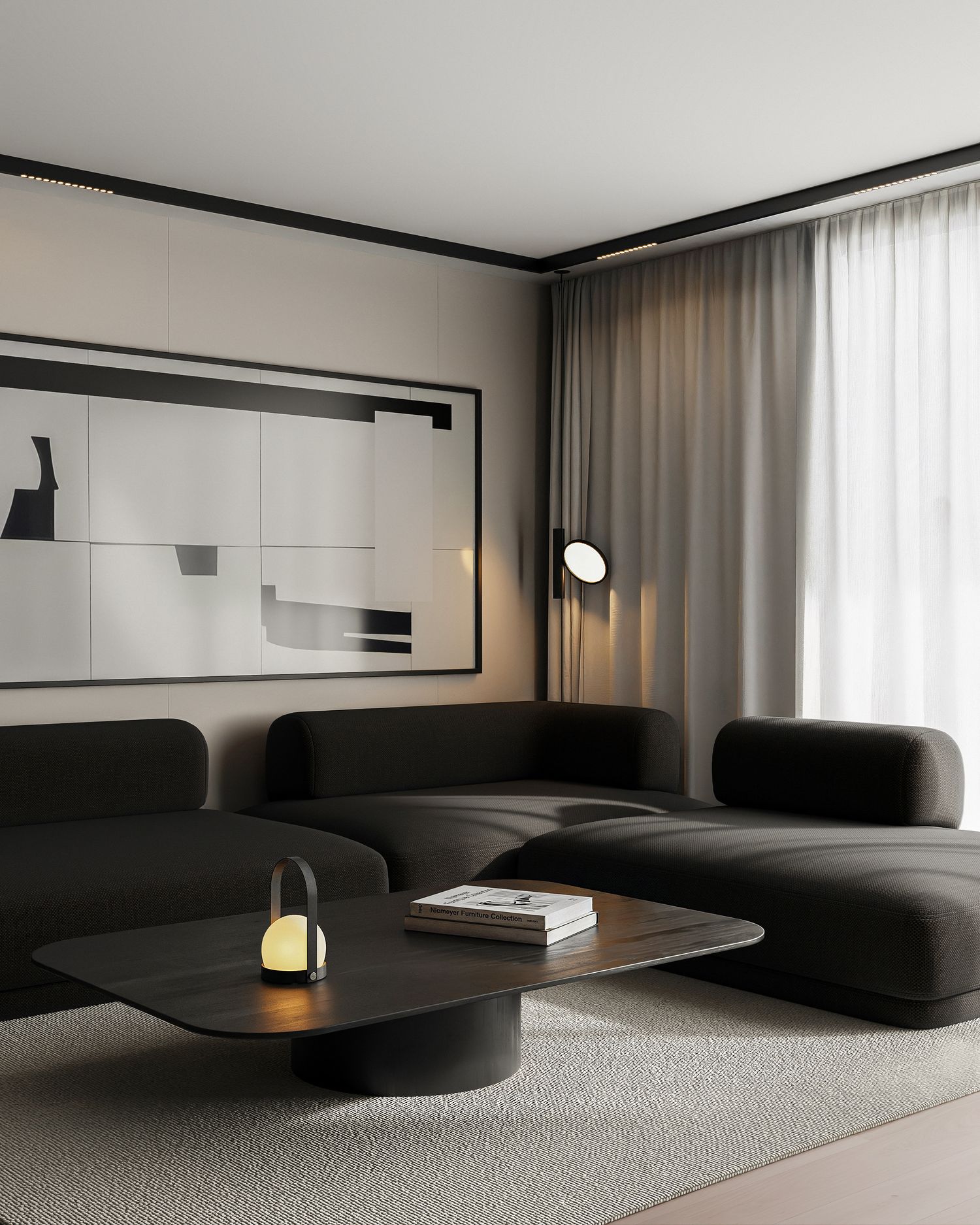 Minimalist living room with dark modular sofa, abstract wall art, round coffee table, and soft neutral tones.