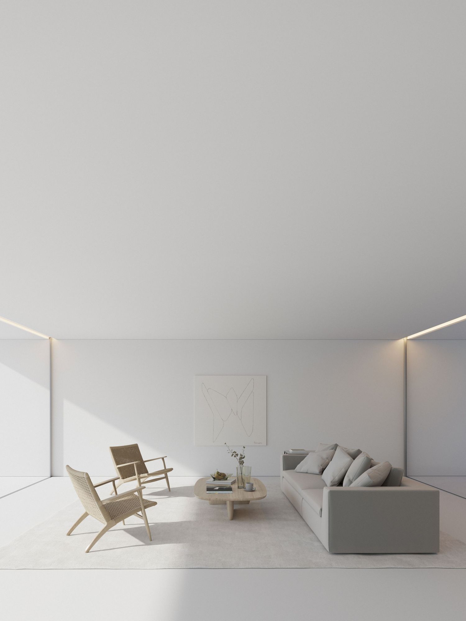 Minimalist living room with gray sofa, wooden chair, and clean white walls illuminated by hidden lighting.