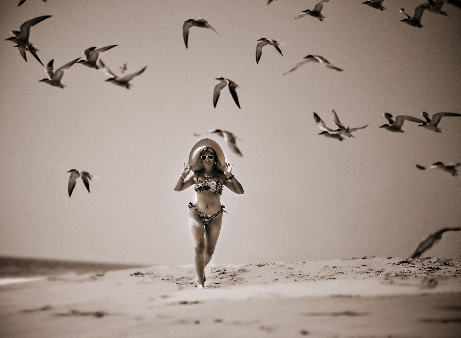 a woman posing during a summer beach photo session Wayne Pennsylvania photographer