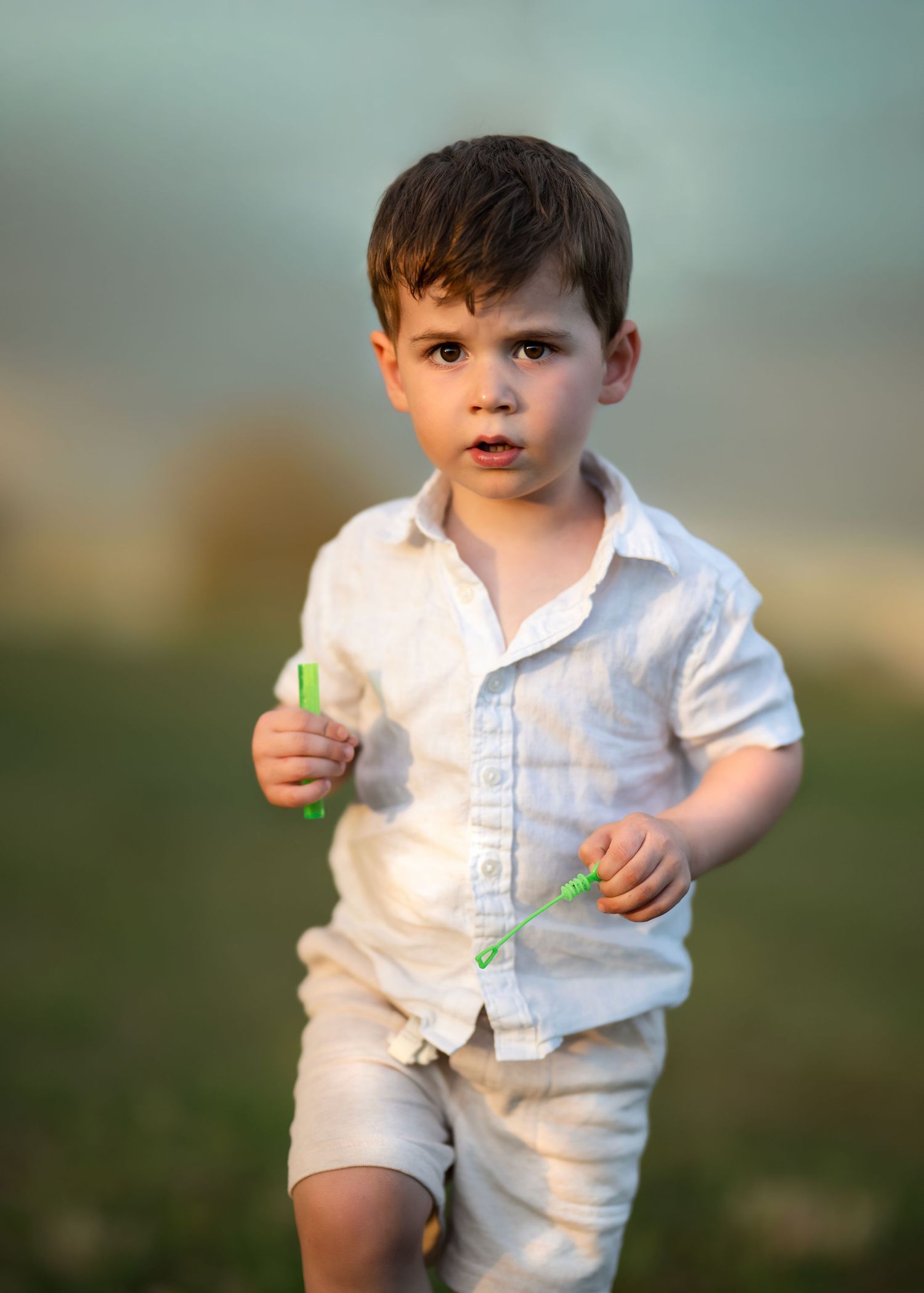 A young boy playing at Mommy & Me portrait session near Wayne, PA.