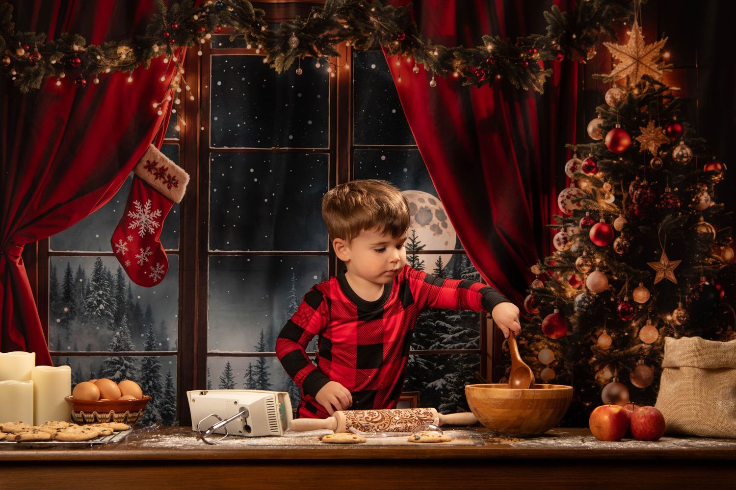Festive holiday table setting with Christmas tree, red curtains, and glowing lights in background.