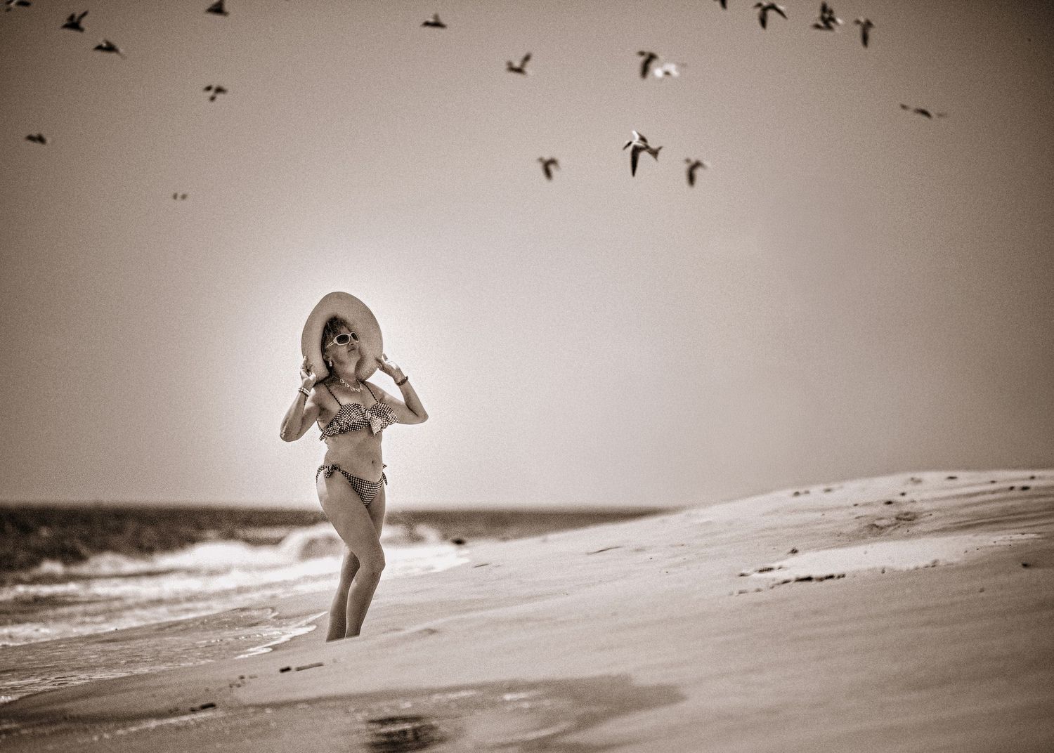 a woman posing during a summer beach photo session Wayne Pennsylvania photographer