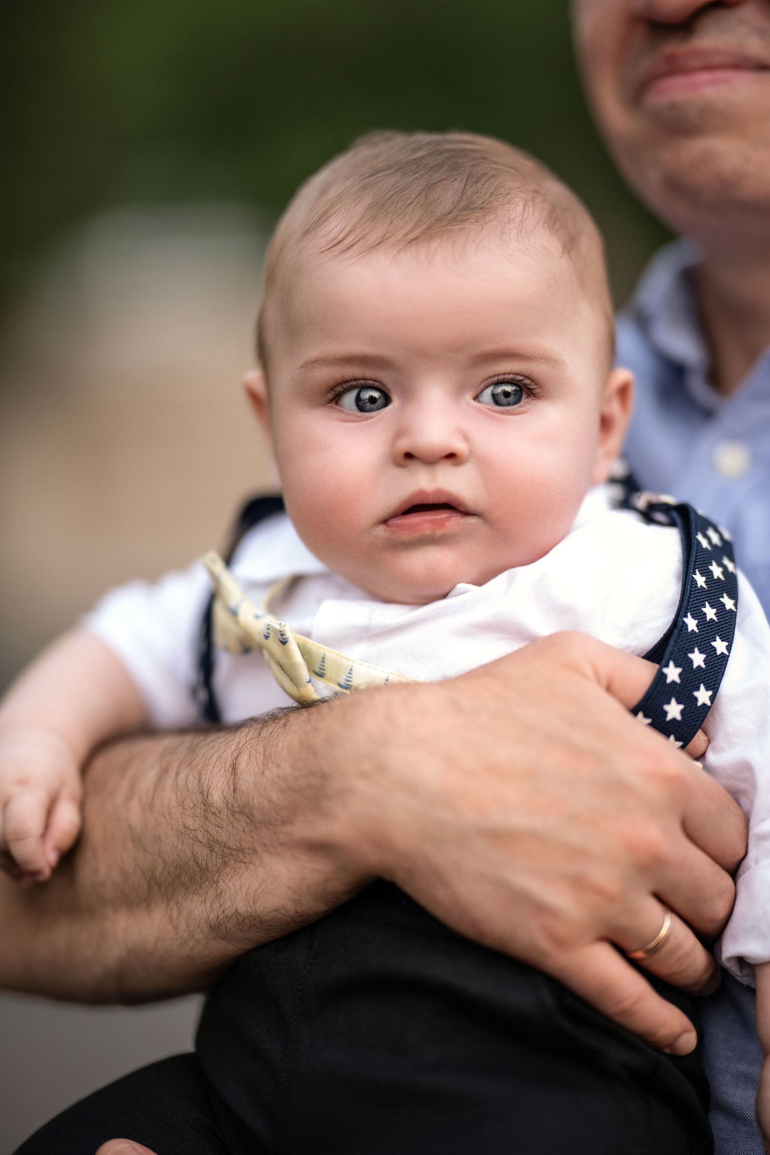 Baby portrait outdoors during a family photography session on the Main Line, PA.