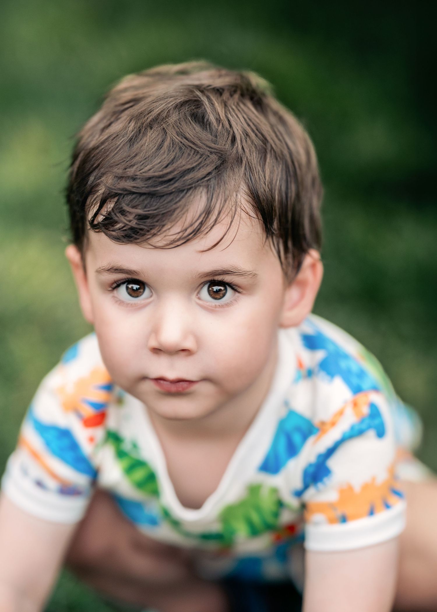 A young boy posing during his Mommy & Me portrait session on the Main Line, PA.
