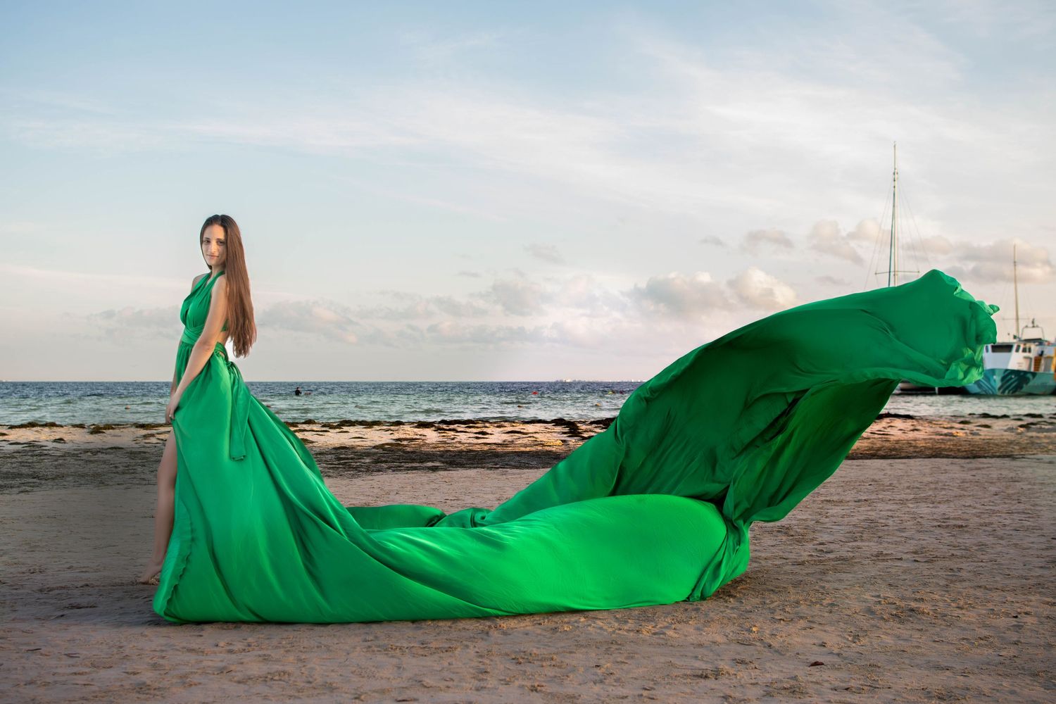 Green flying luxury photo session with satin flying green dress on the beach Wayne PA