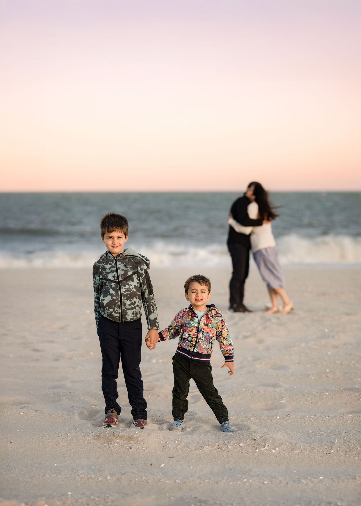 A family of four during their outdoor family portrait session.