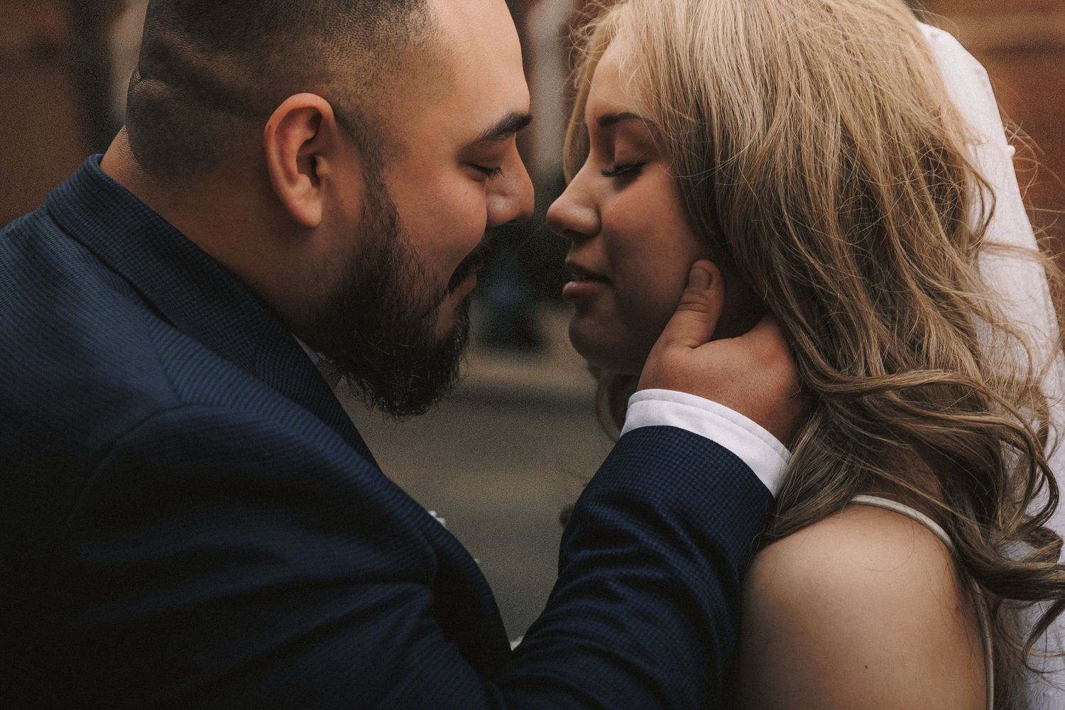 A romantic couple in formal attire sharing intimate moments in a series of close-up photos.