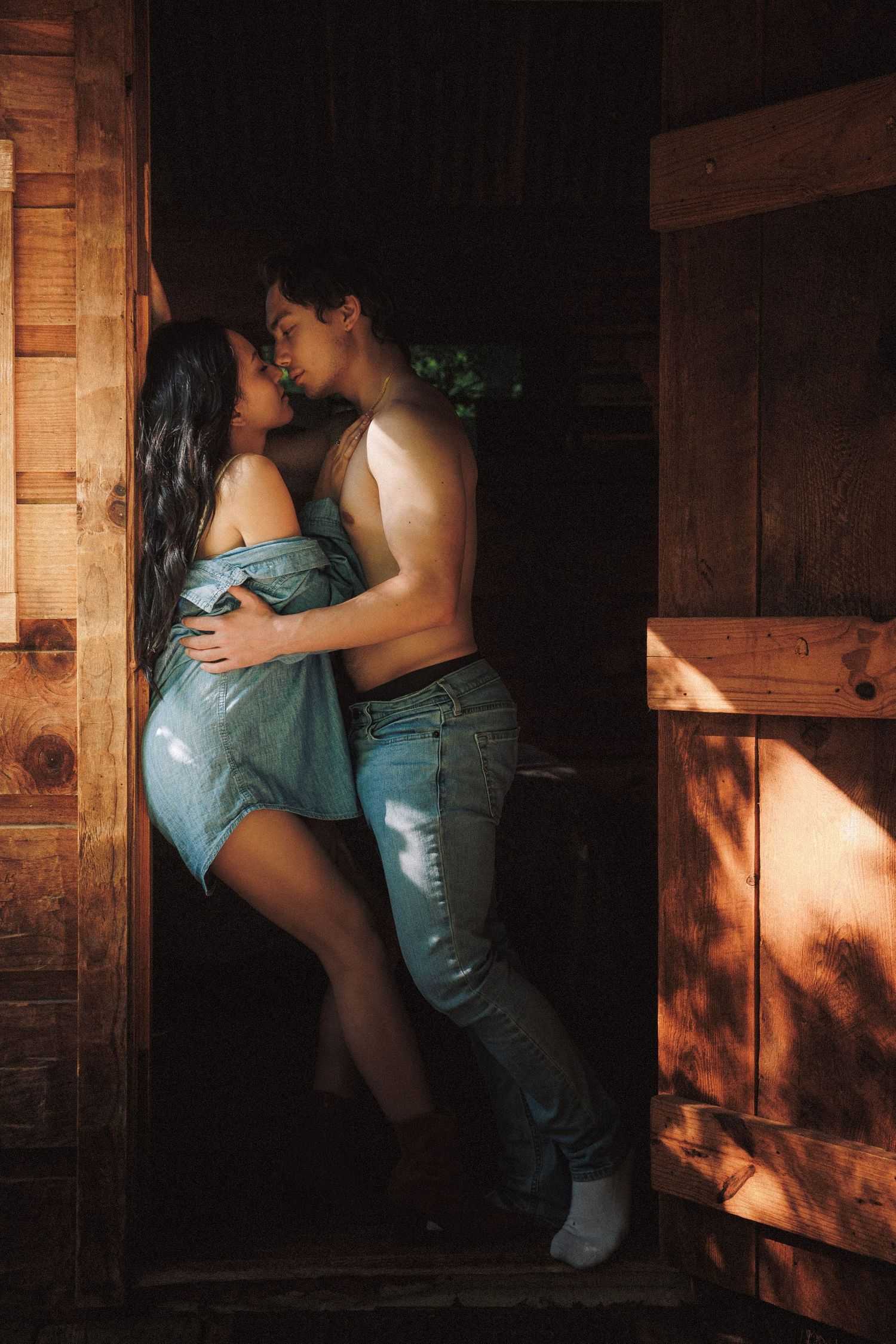 Artistic photo sequence showing figures in denim expressing intimate dance movements in a rustic wooden setting.