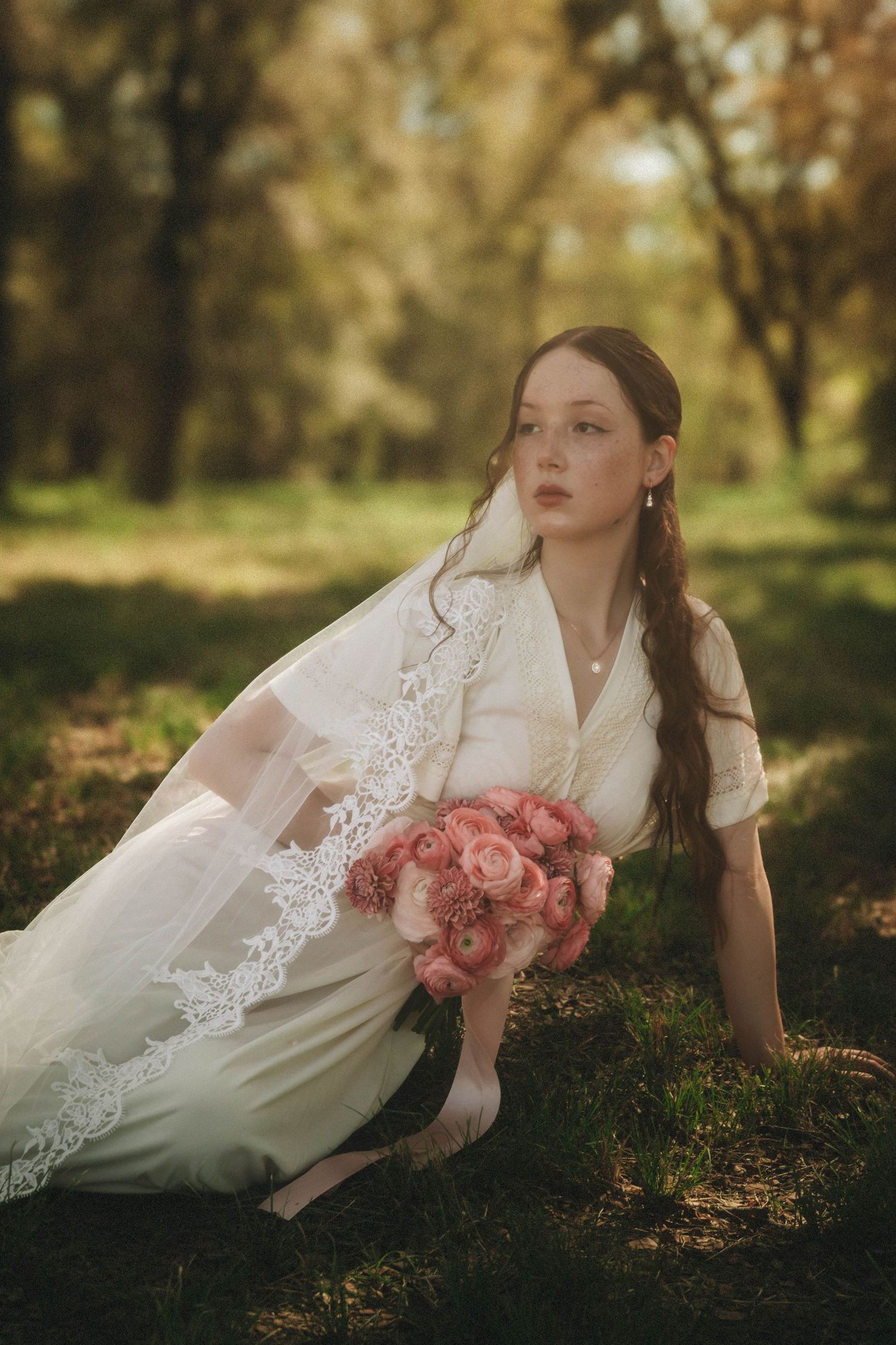A series of dreamy outdoor portraits with lace veil and pink roses against an autumn backdrop in natural light.