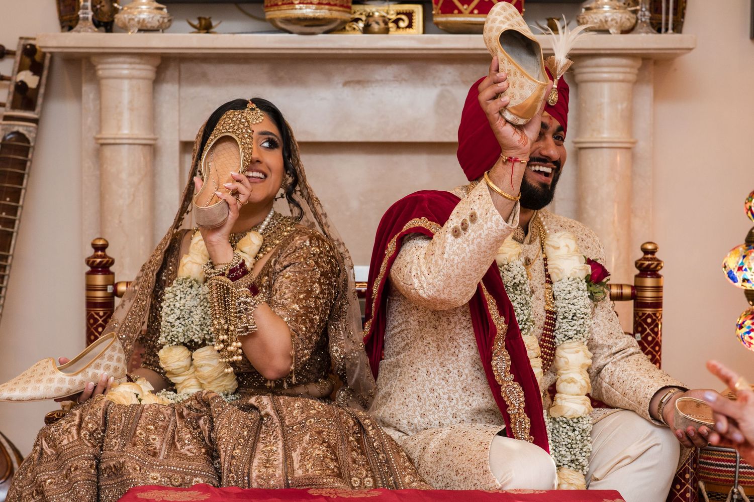 Bride and groom taking part in a traditional Asian wedding ceremony