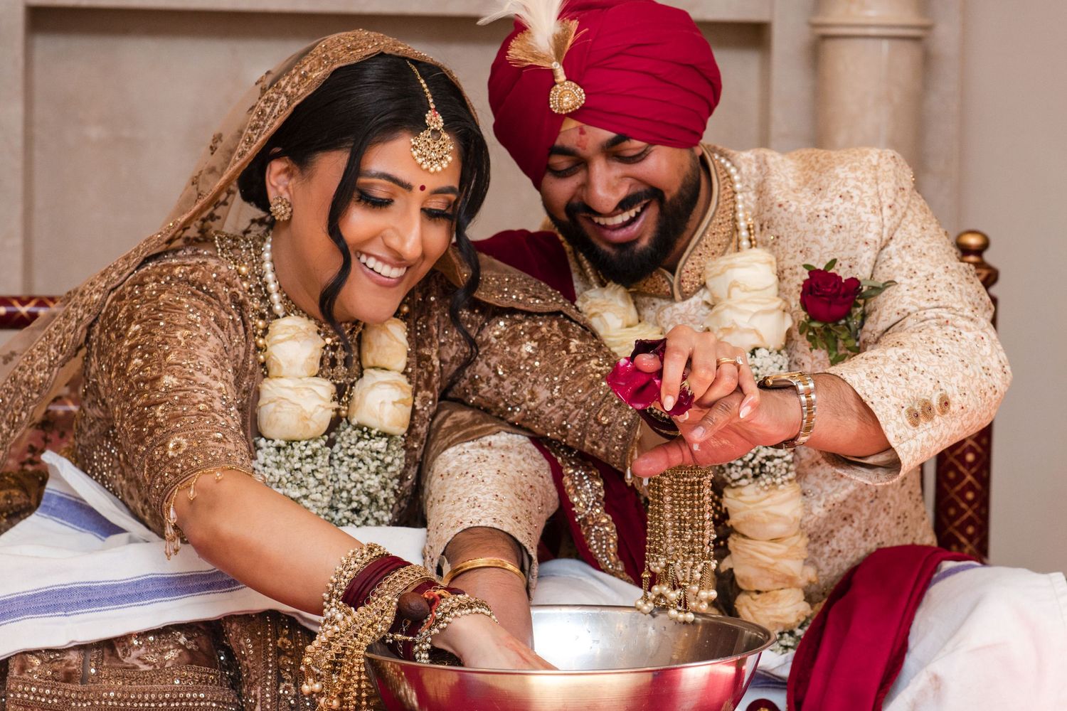 Bride and groom sharing a joyful moment during their wedding ceremony