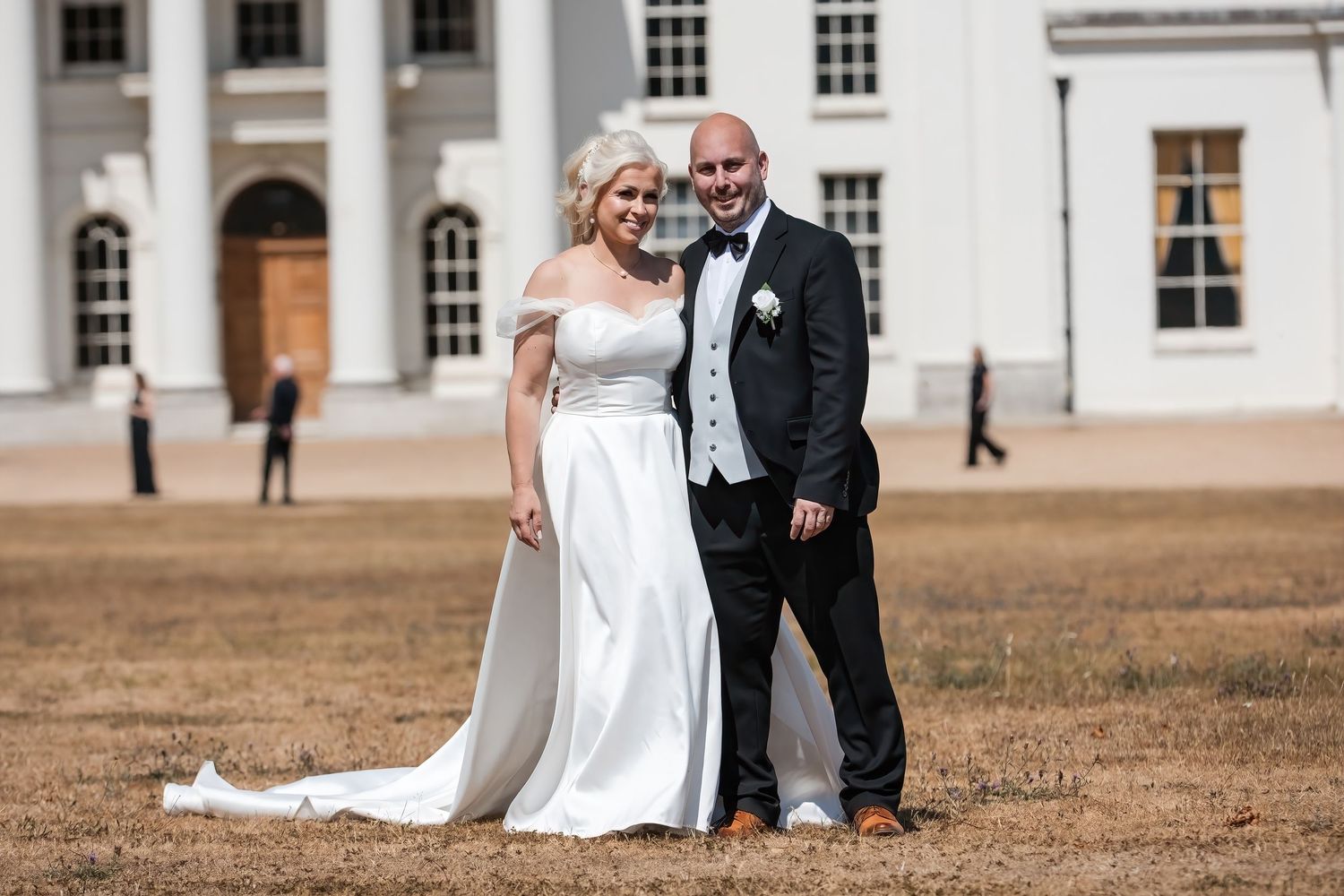 Bride and groom portrait outside their wedding venue