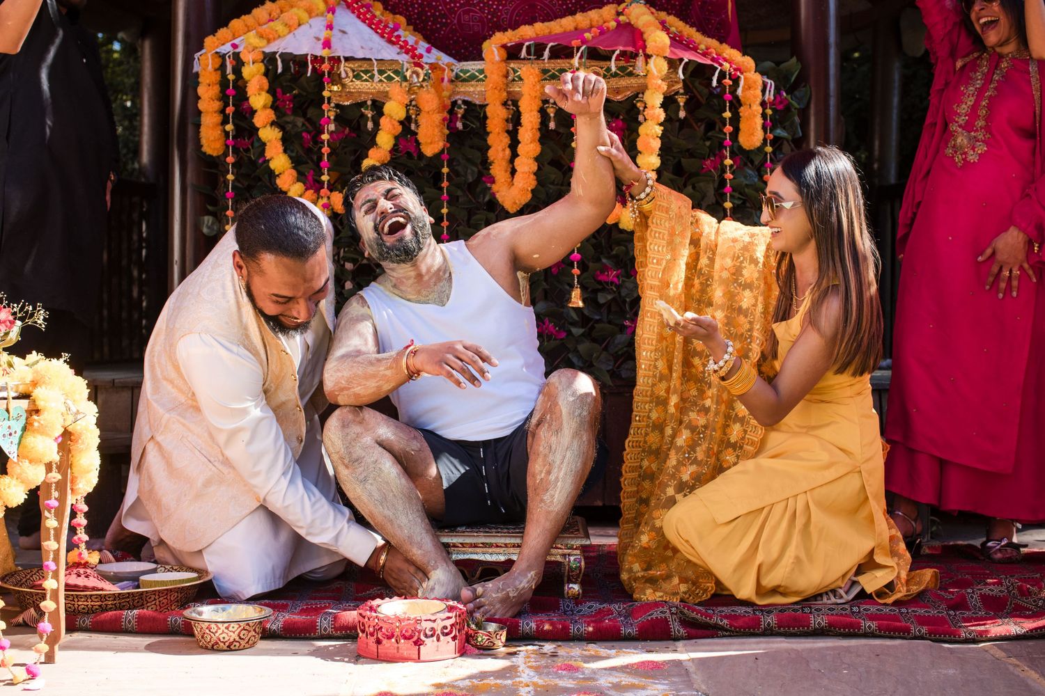 Family and friends celebrating during a traditional pre-wedding ceremony