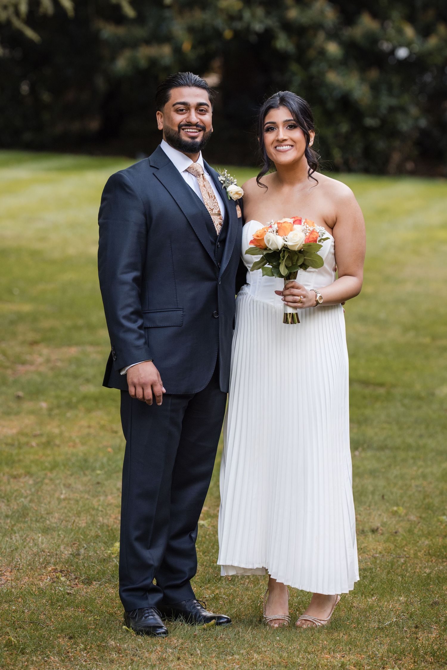 Bride and groom outdoor wedding portrait