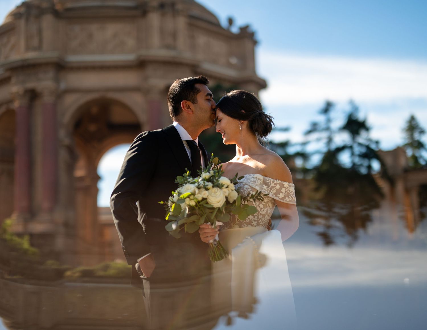 Bride and groom at Palace of Fine Arts, San Francisco wedding portrait, luxury wedding photography by The Padillas.