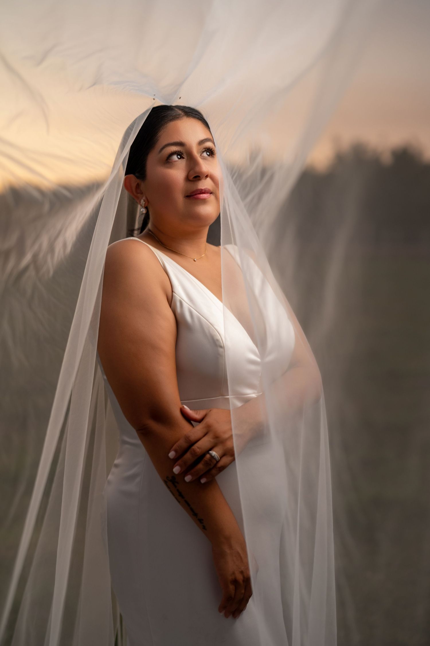 Bride in veil at sunset, wedding portrait at The Ranch at Lone Oak, Northern California wedding photography by The Padillas.
