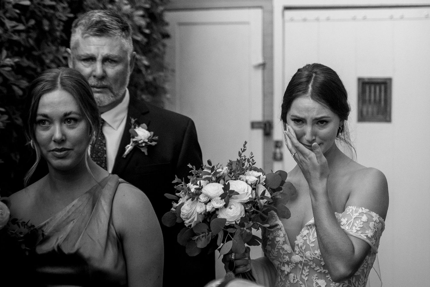 Bride tearfully entering wedding ceremony, emotional wedding moment captured by The Padillas in San Francisco.