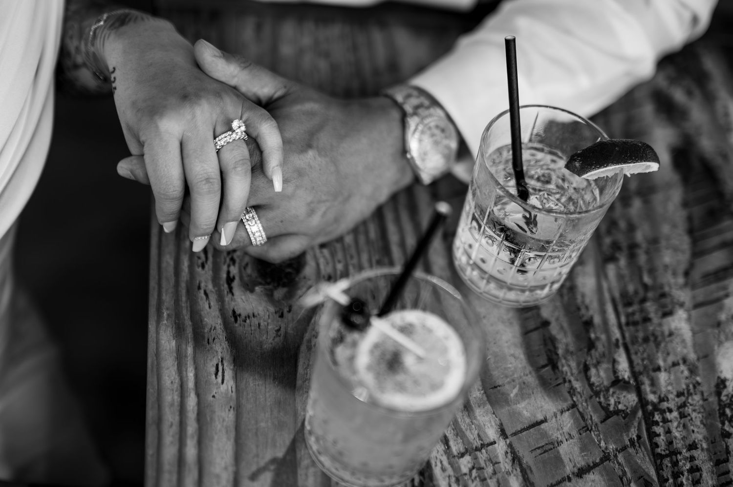 Engagement ring close-up with cocktails during downtown Sacramento engagement session