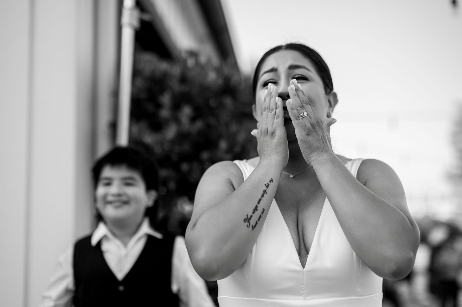 Bride reacts emotionally during wedding celebration at The Ranch at Lone Oak, California wedding photographer The Padillas.