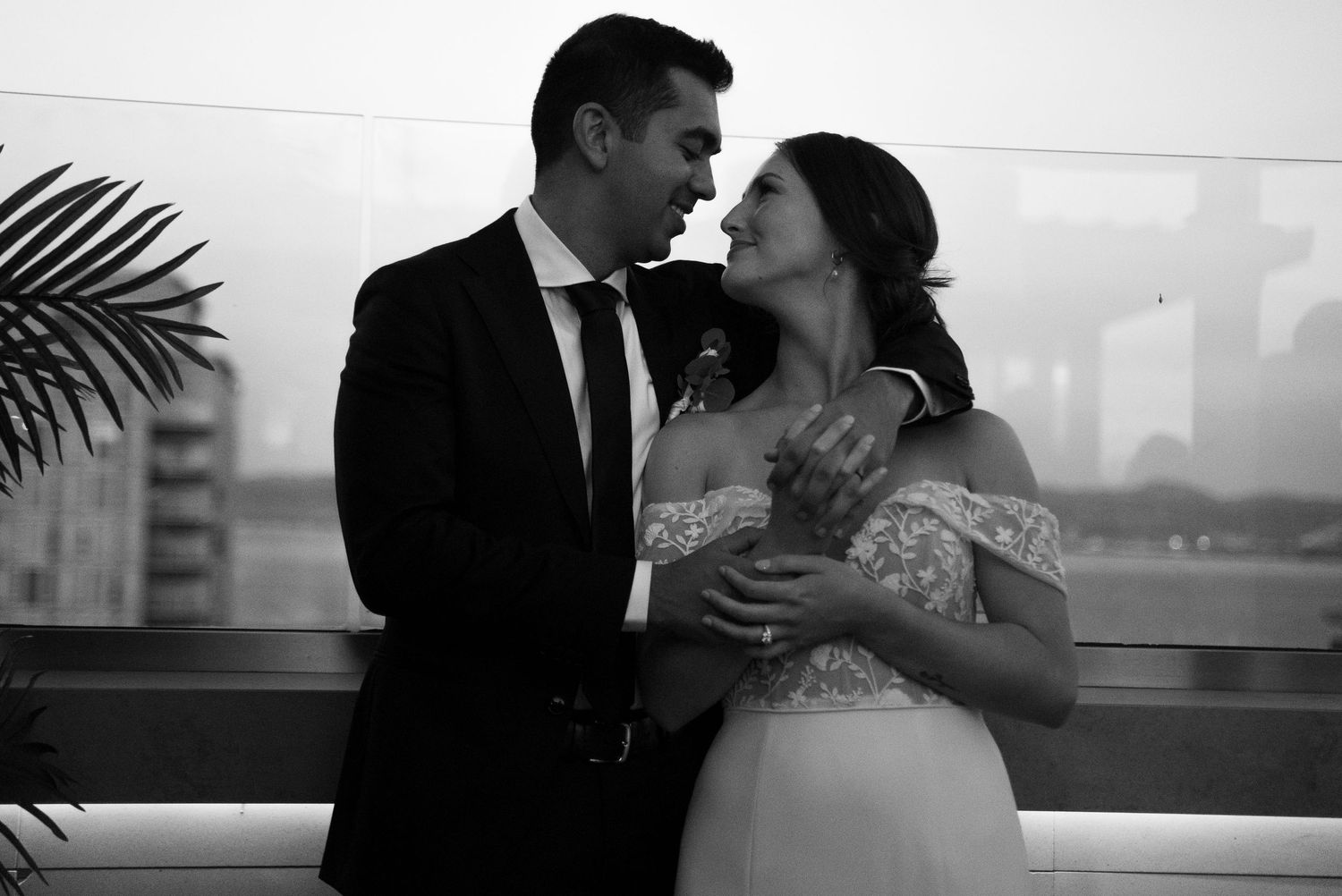 Bride and groom sharing intimate moment during wedding portrait session, documentary wedding photography by The Padillas.