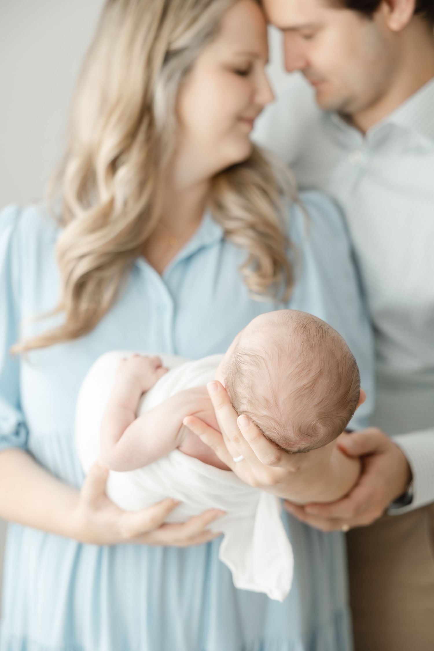 Newborn photography studio in Hendersonville NC capturing soft, timeless newborn portraits in natural light.