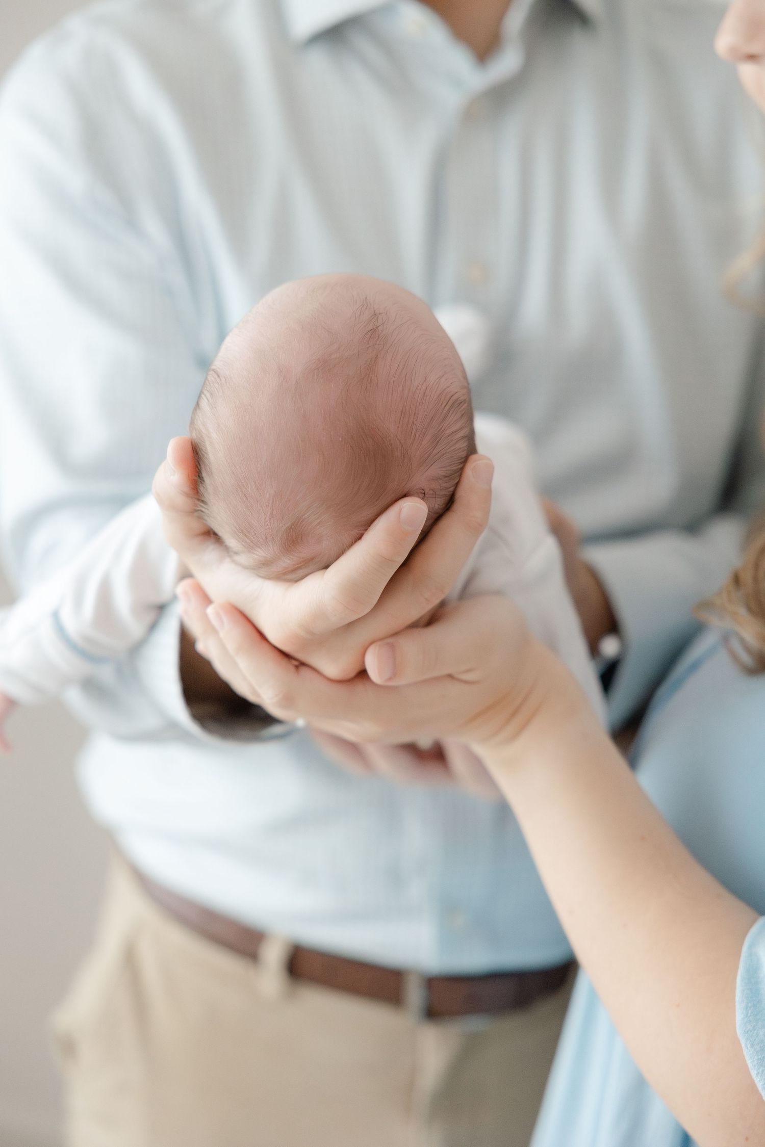 Newborn photography studio in Hendersonville NC capturing soft, timeless newborn portraits in natural light.