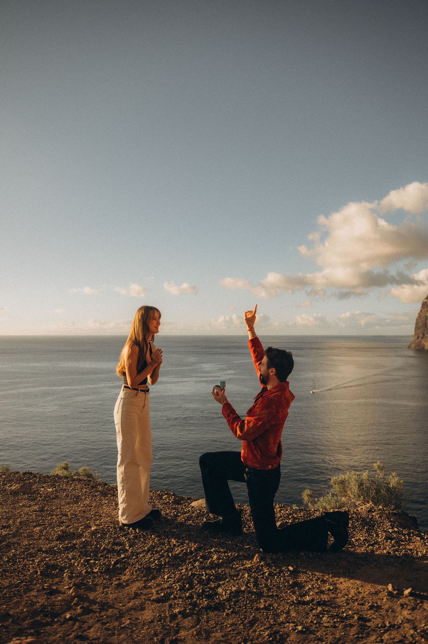 Man proposing during a romantic surprise proposal in Tenerife.