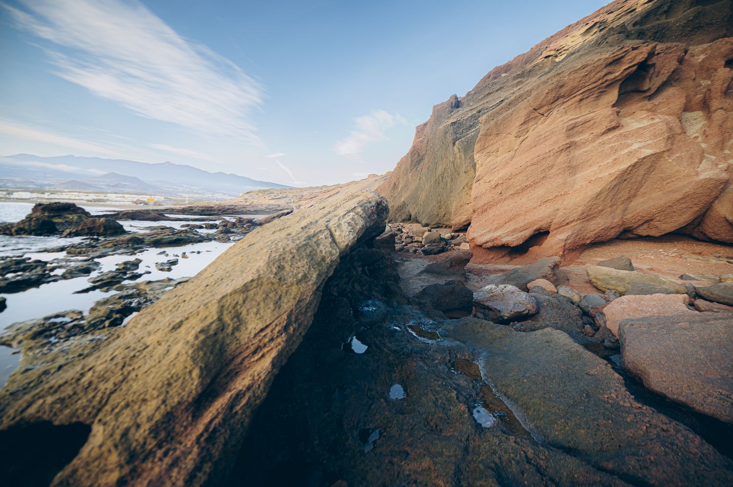 Scenic view of rocky landscape at Montaña Roja on Tenerife’s coast