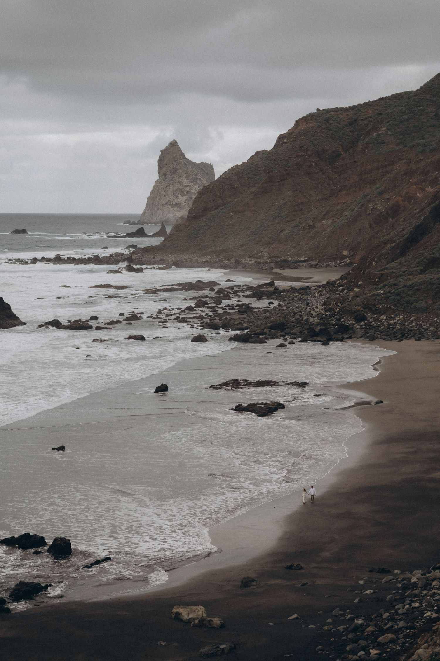 Majestic Playa Benijo in Anaga Park Tenerife with couple walking along the ocean