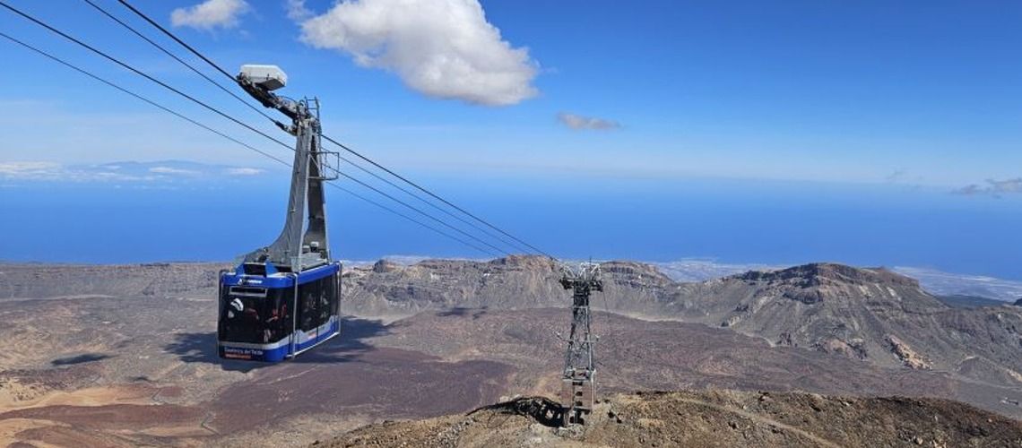 Cable car cabin ascending towards Mount Teide with panoramic view in Tenerife