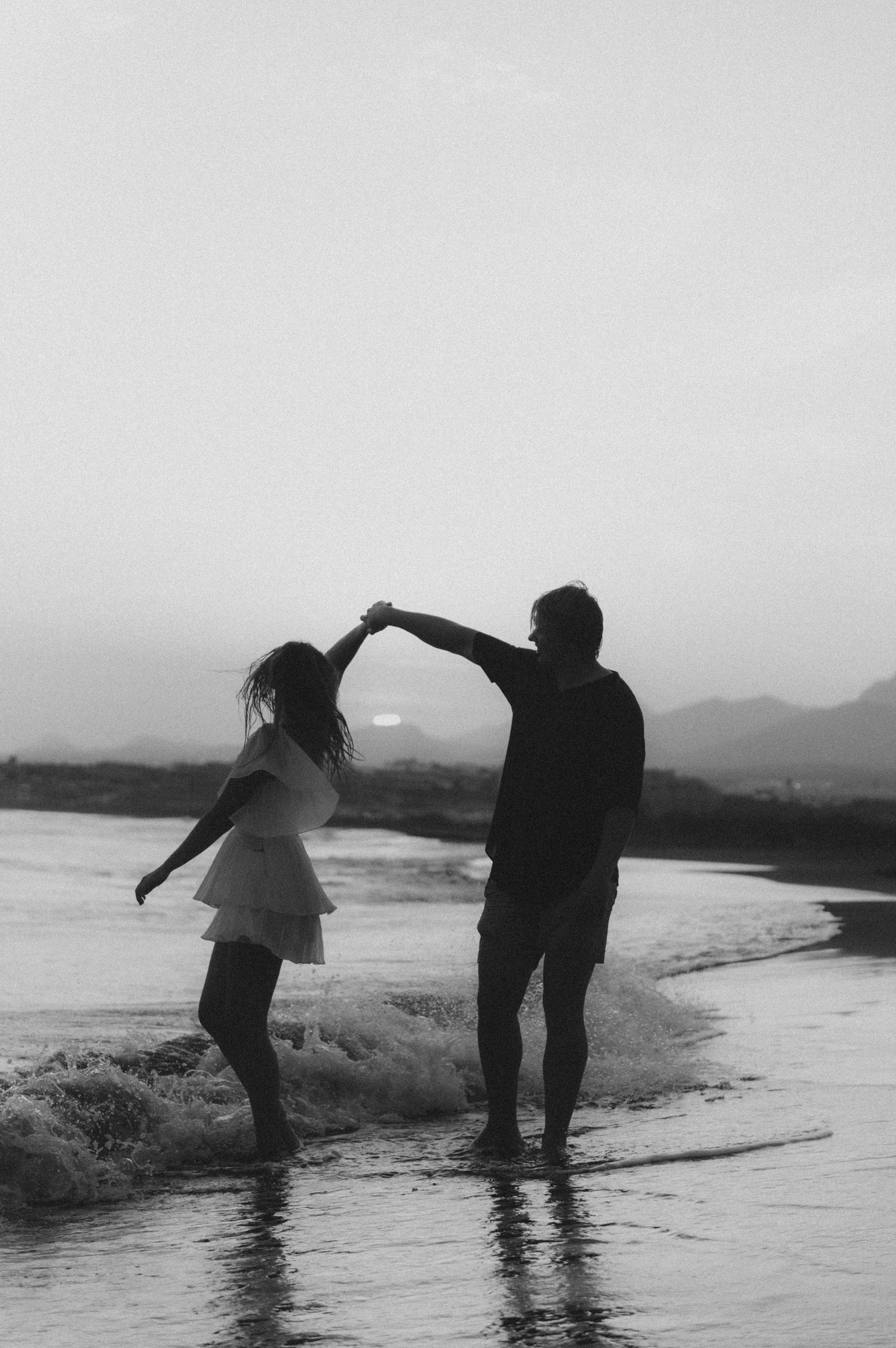 Dancing couple on Playa Tejita, Tenerife couples photoshoot by the beach