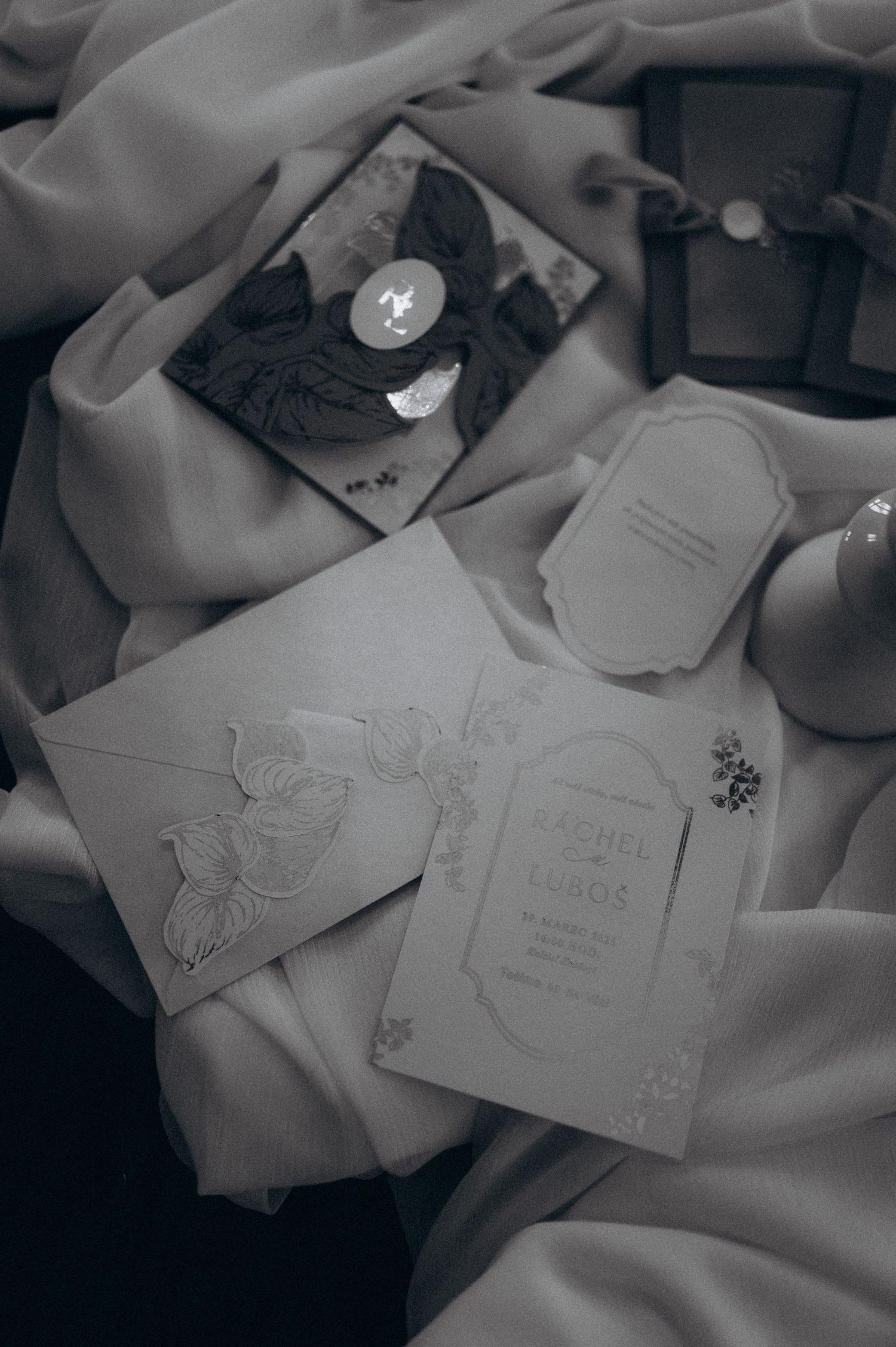 Black and white close-up of handwritten wedding vows on paper.