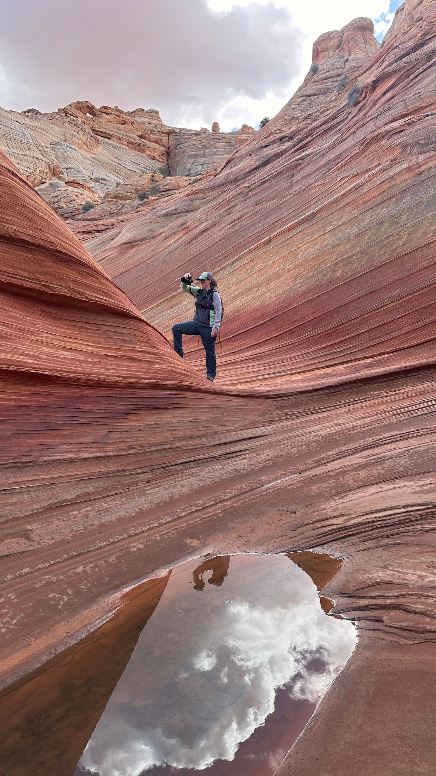 The Wave hike photographer Jenny Casad in colorful sandstone in southwestern Utah/Page, Arizona