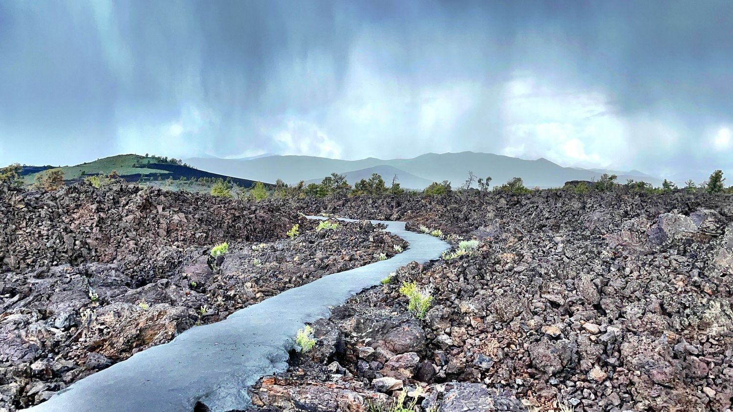 Craters of the Moon National Monument photography moon rocks rainy sky and clouds