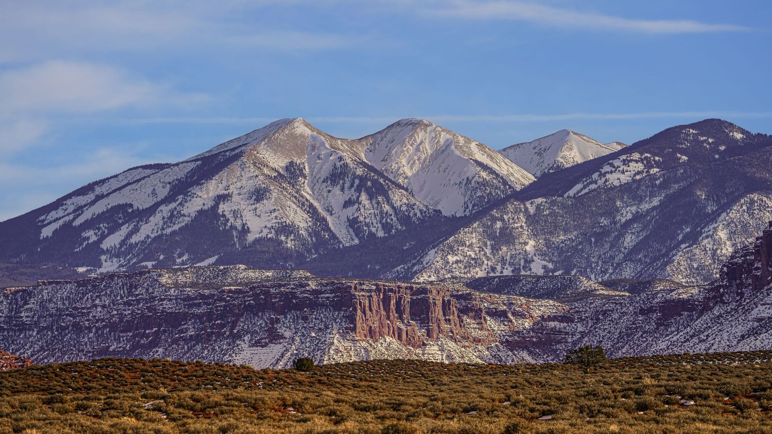 Moab, Utah Highway 128 Colorado River Road Fisher Towers photography red rock canyons and cliffs with La Sal Mountains