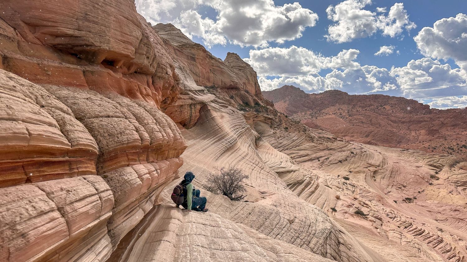 The Wave hike photographer Jenny Casad in colorful sandstone in southwestern Utah/Page, Arizona