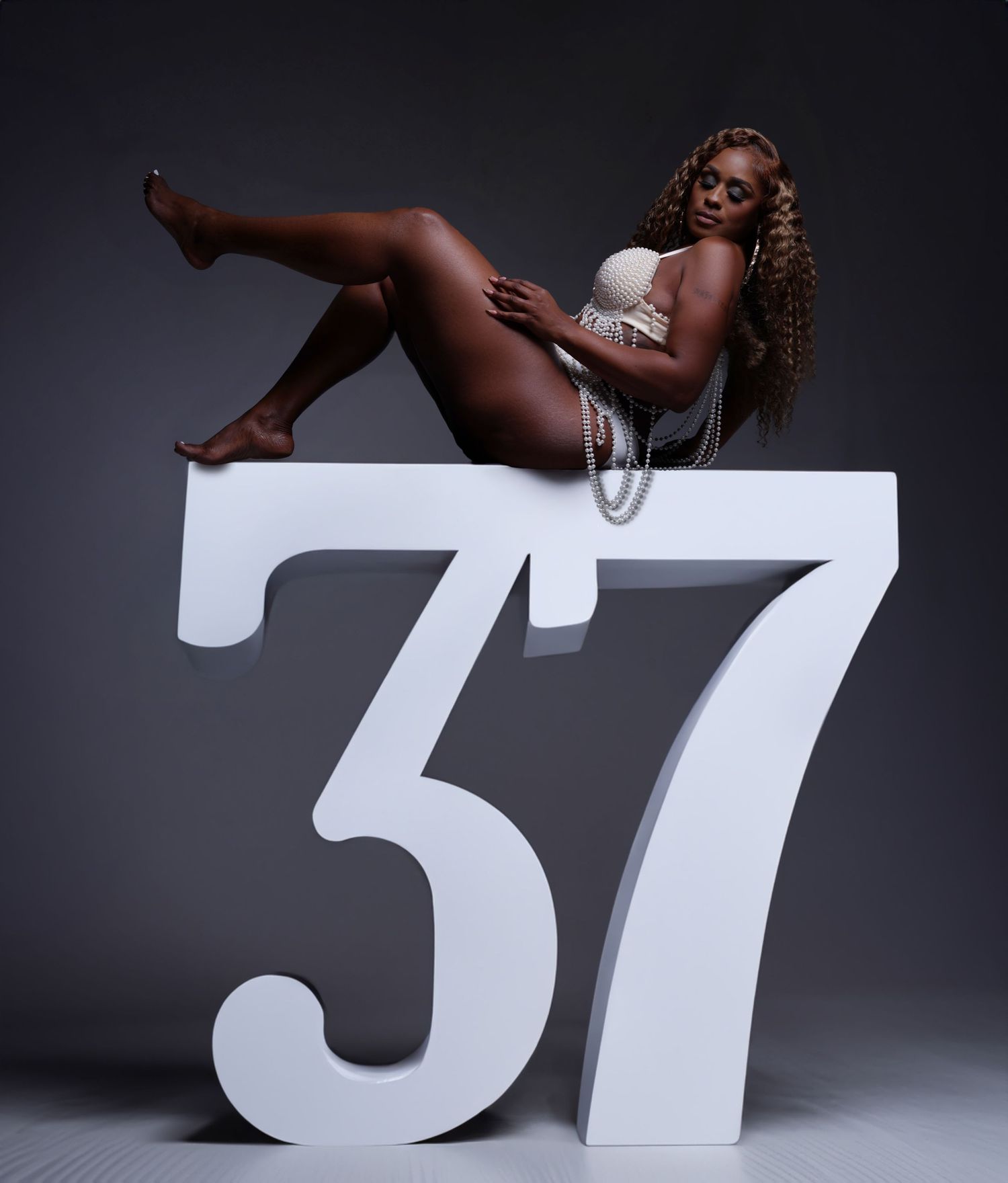 Artistic photo series with numbers 37 in white against dark background. In Tampa Florida.