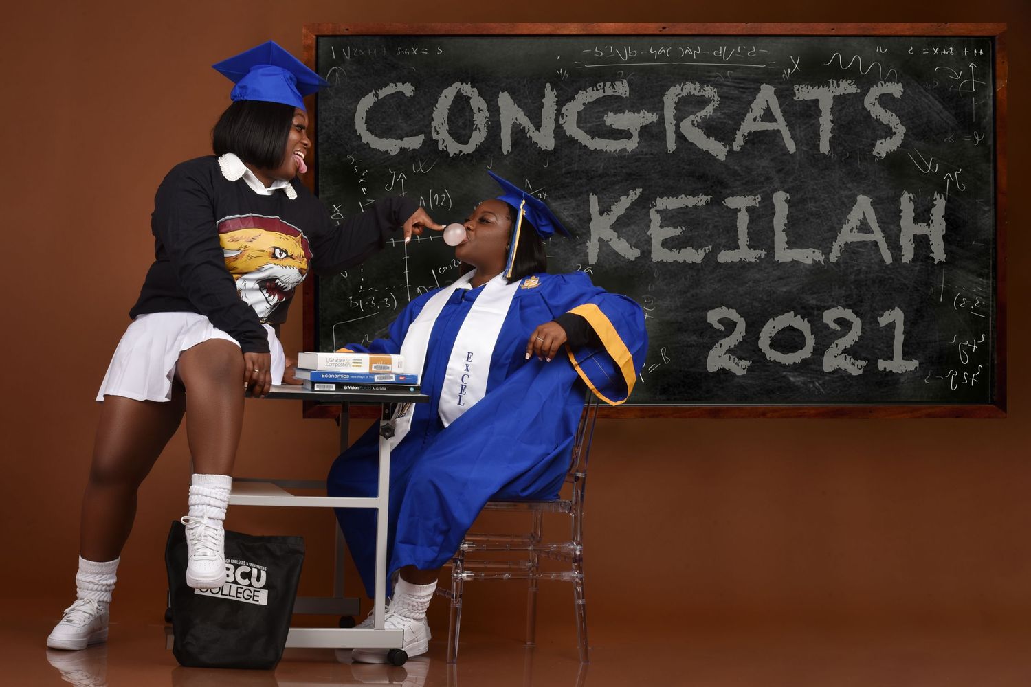 Graduation celebration scene with congratulatory message written on chalkboard. in Saint Petersburg Florida.