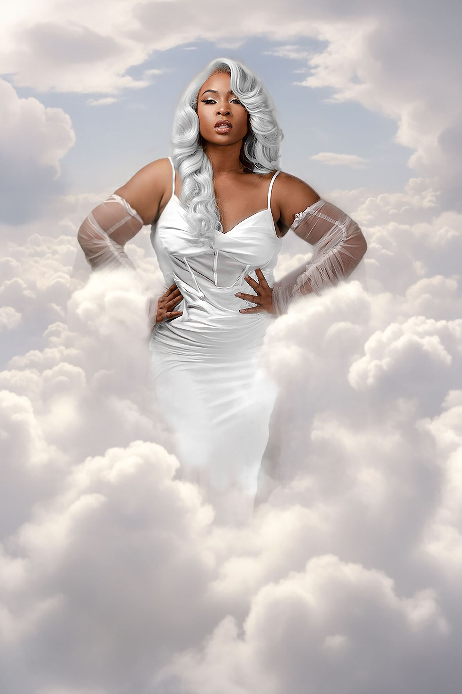 Fashion model in white dress poses elegantly against cloudy sky background in ethereal photoshoot. In Tampa Florida.
