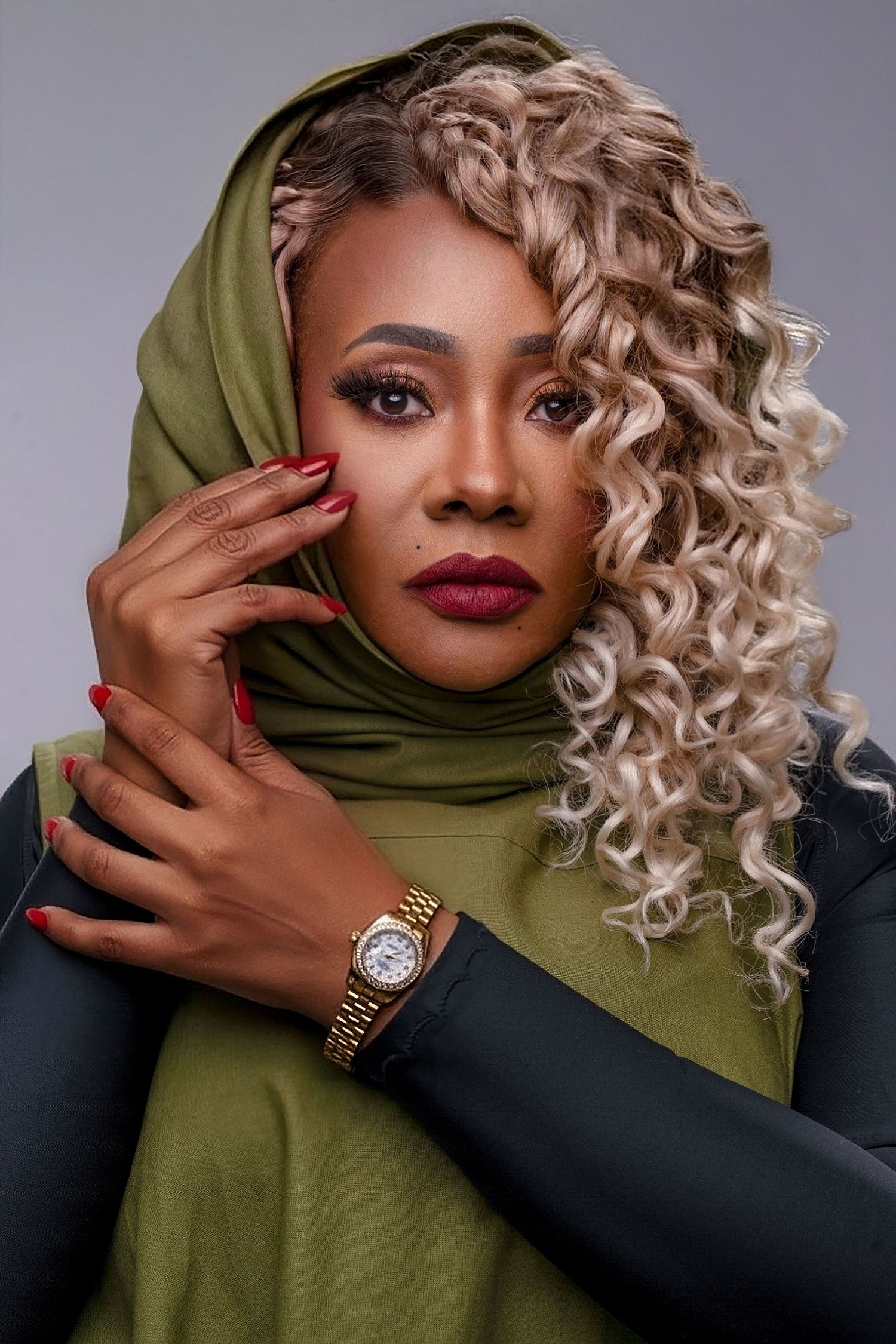 Fashion portrait series featuring olive green hijab and glamorous blonde curls against grey background.