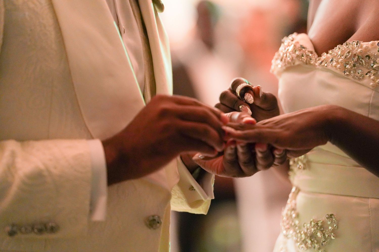 Close-up details of wedding dress preparations showing delicate lace and fabric details in Saint Petersburg Florida.