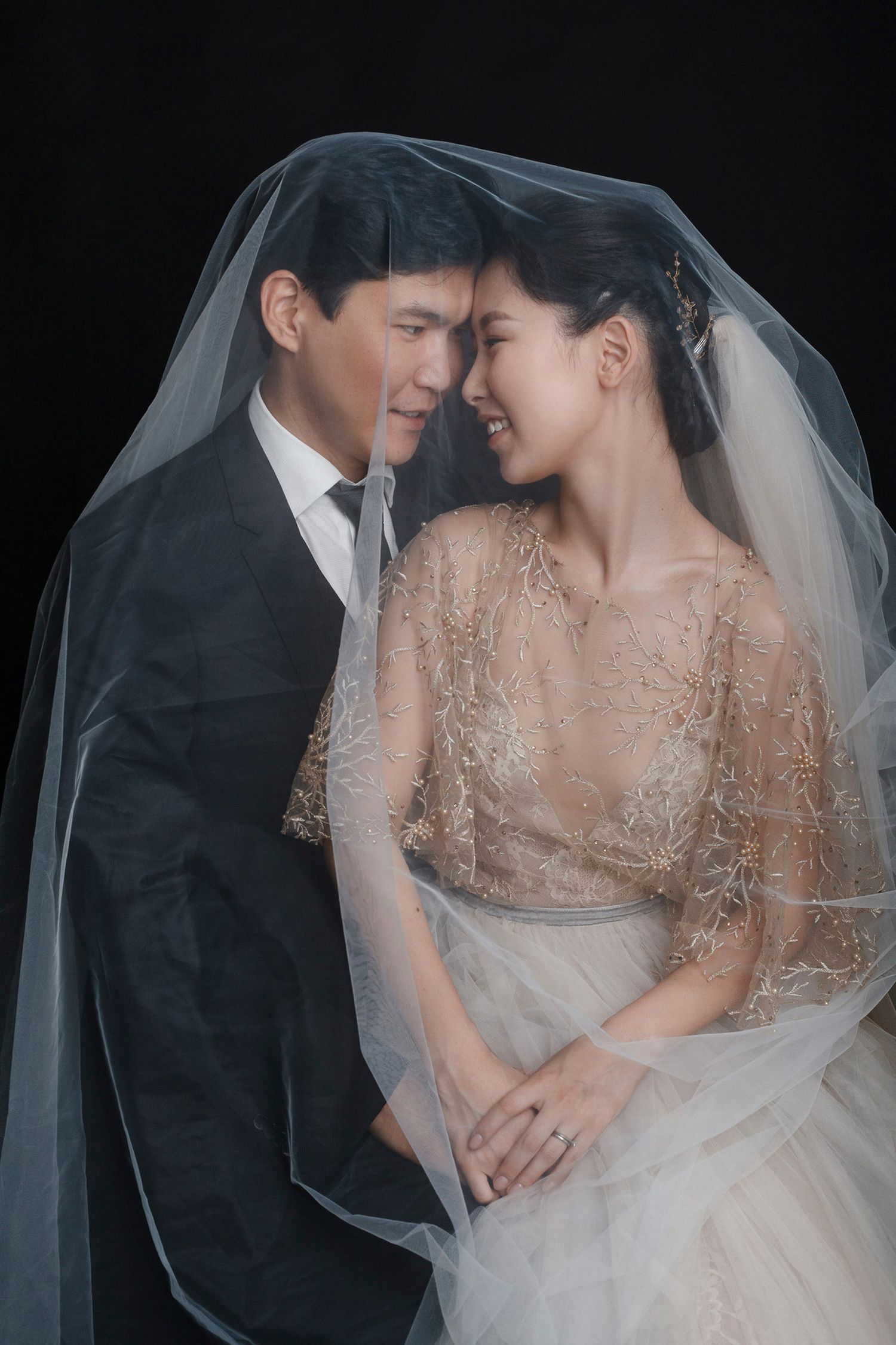 A romantic wedding photoshoot sequence captures intimate moments between newlyweds in elegant formal attire.