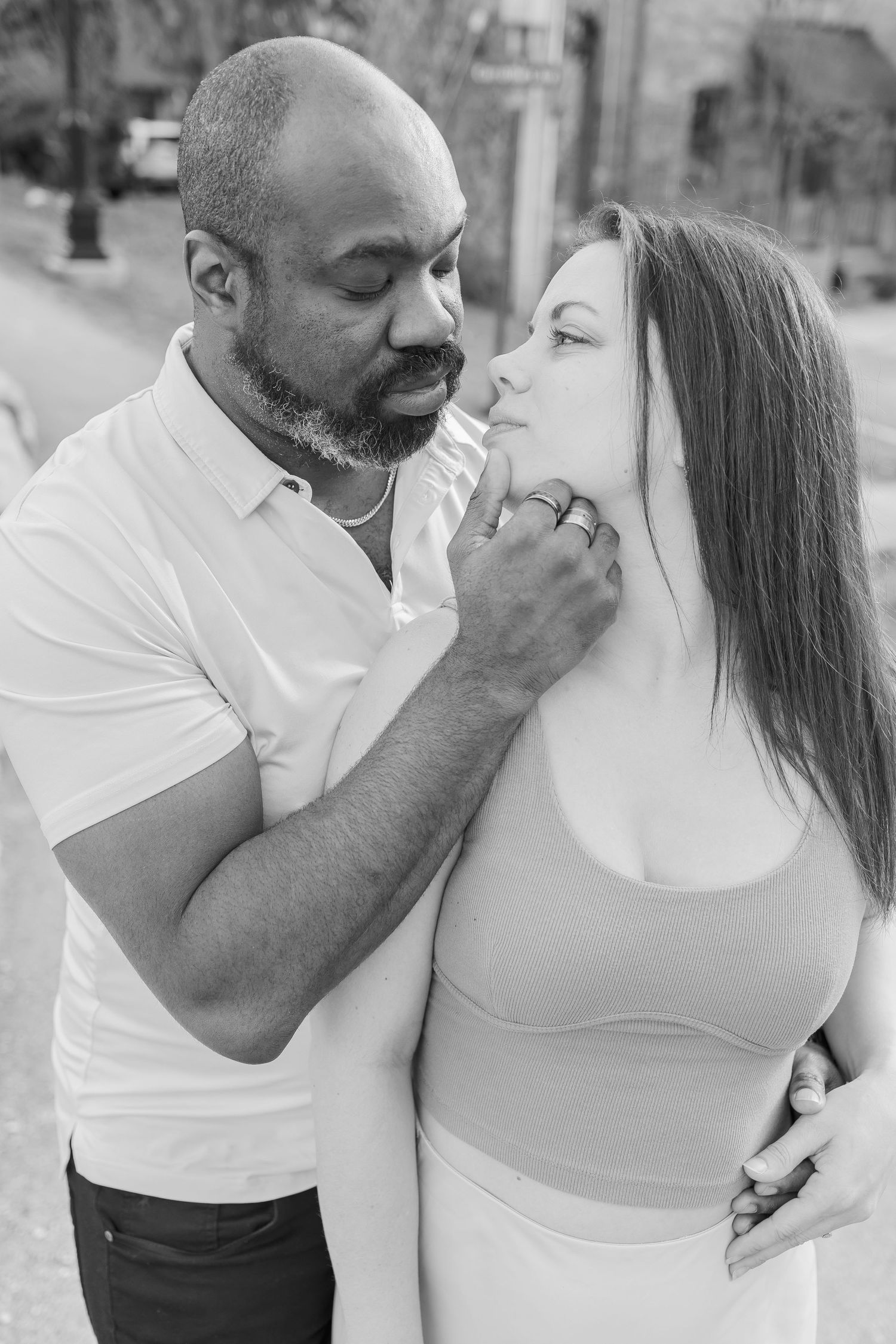 Intimate close-up portraits of couple during outdoor photoshoot.