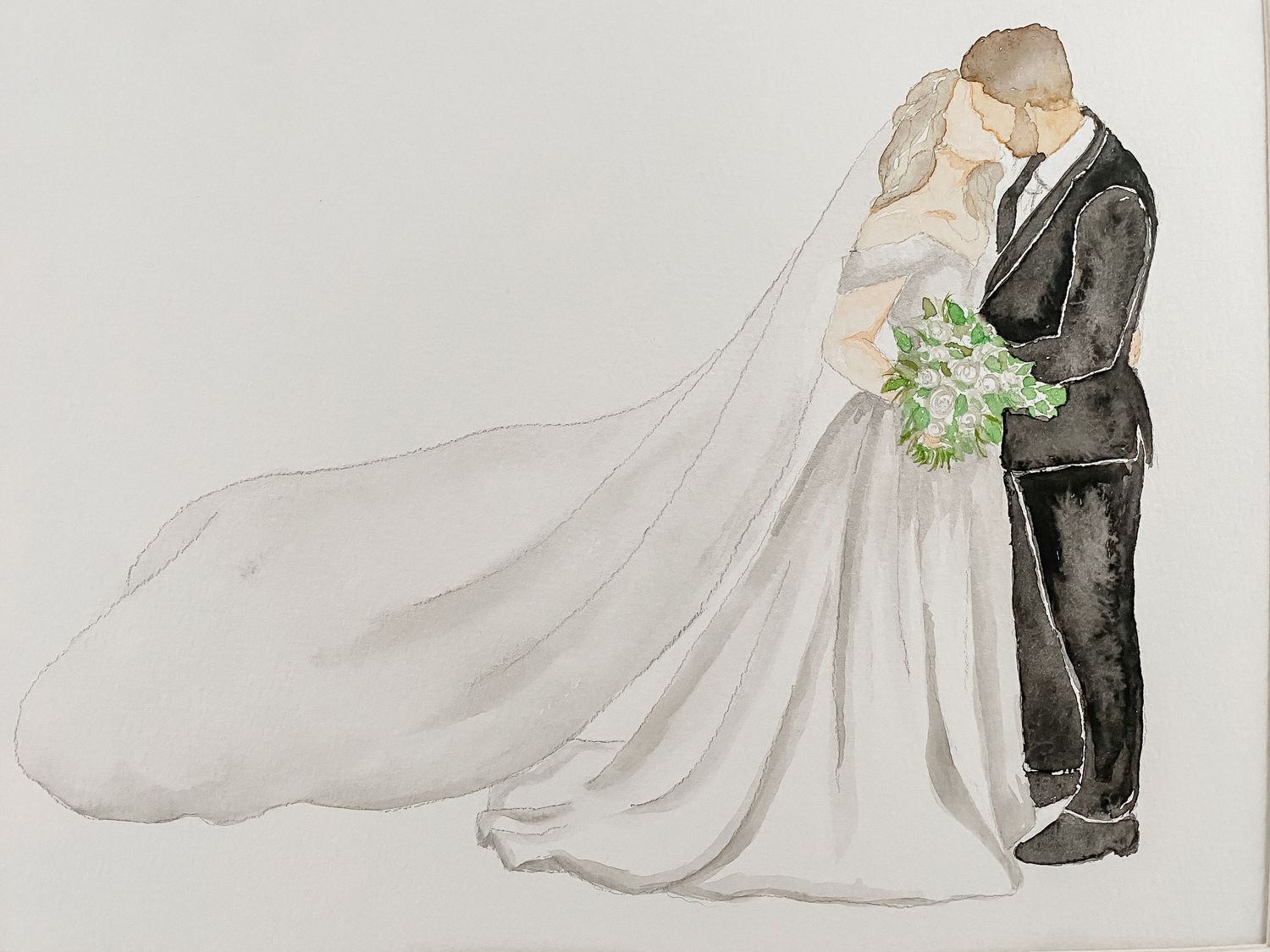 A bride and groom share a romantic kiss during their wedding ceremony as her veil flows in the breeze.