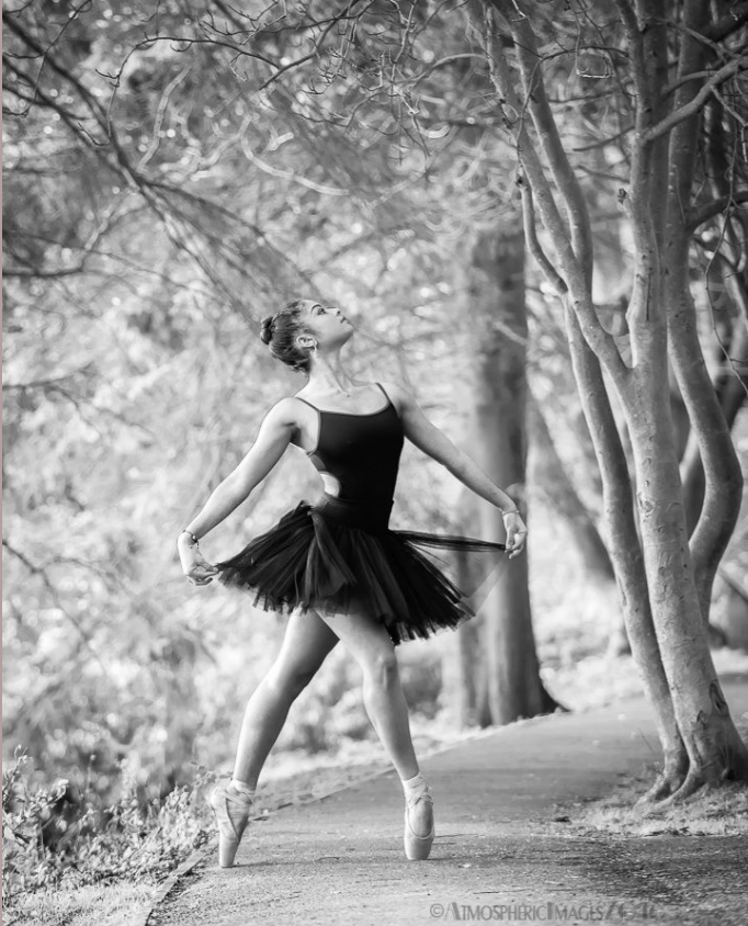 Black and white photos of a ballet dancer performing graceful movements in a wooded path.
