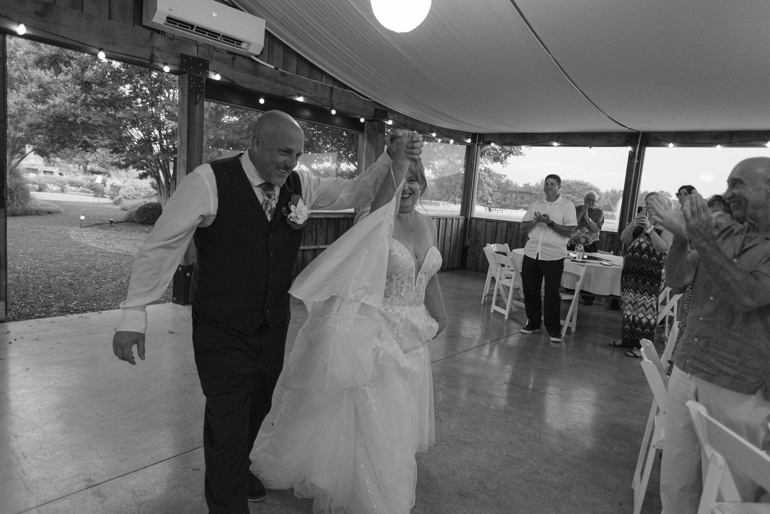 Bride and groom entrance into reception