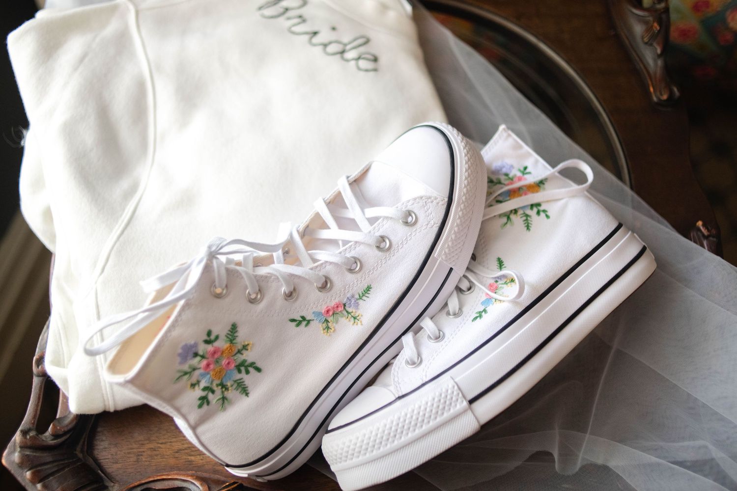 the brides embroidered chuck taylors