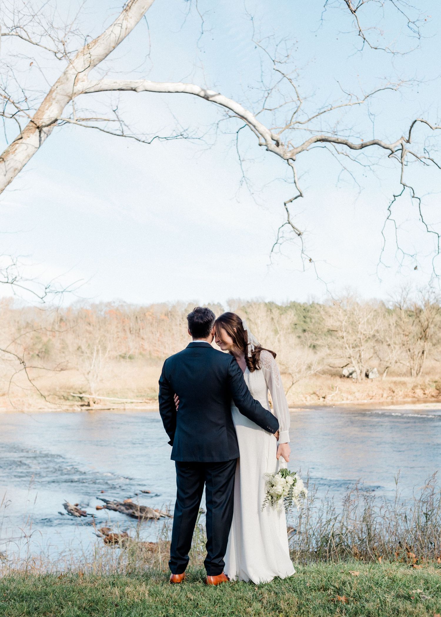 bride-groom-near-river-elopement