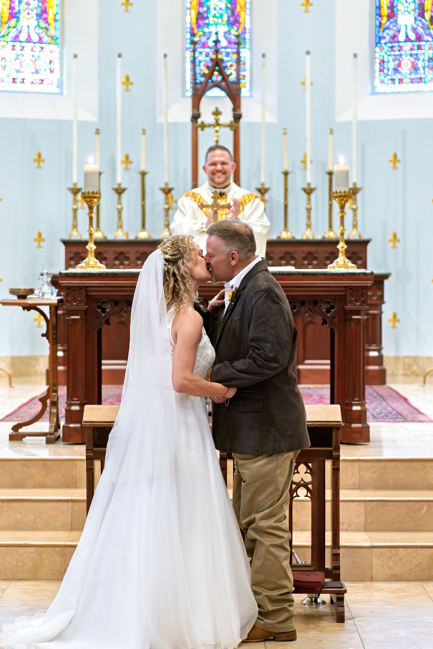 Bride and groom first kiss